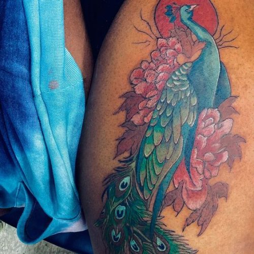 25 Colorful Tattoo Ideas for Dark Skin Tones