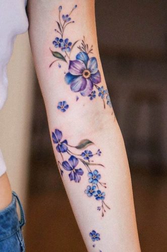 Discover the Charm of February Birth Flower Tattoos: Violets & Primroses Ink Ideas