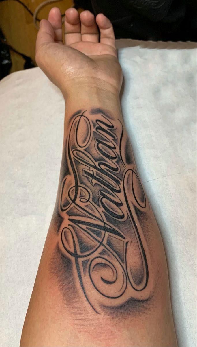 26 Lettering Tattoo Ideas for Men: Bold Fonts, Chicano, Japanese, Vertical, Fine Line & More