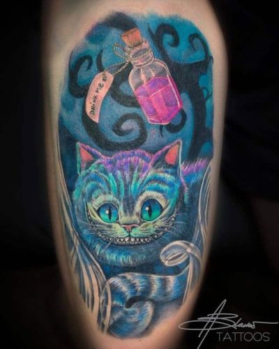 15 Cheshire Cat Tattoo Ideas for Whimsical Souls