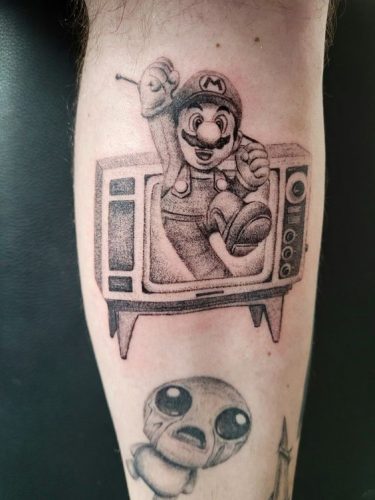 Explore 19 Unique Super Mario Tattoo Designs to Celebrate Your Love for the Iconic Game in