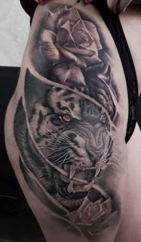 25 Tiger Tattoo on Thigh Ideas