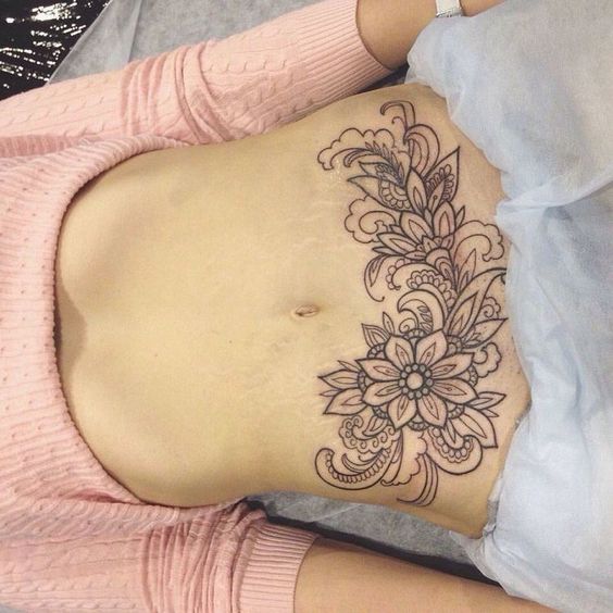 22 Ideas for Lower Stomach Tattoos: Stunning Designs and Unique Personal Statements