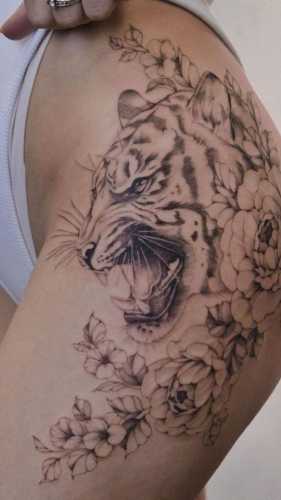 25 Tiger Tattoo on Thigh Ideas