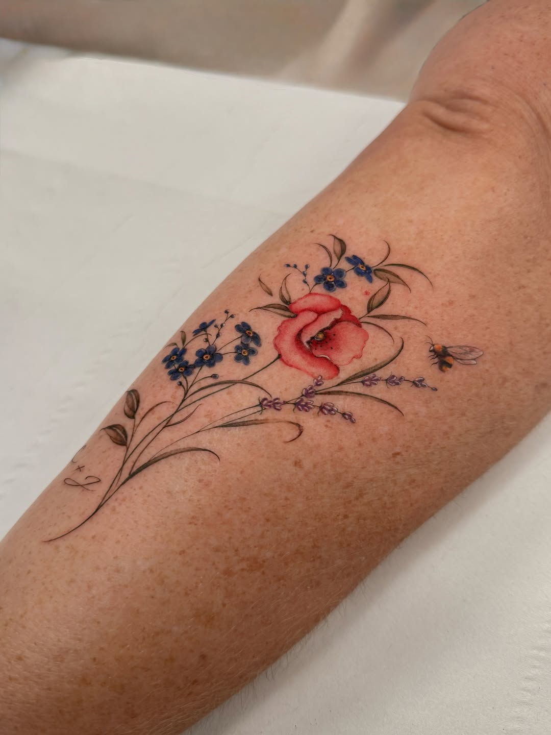 29 Wildflower Tattoo Ideas: Dainty Fine Line, Arm Sleeves, Ankle Wraps, Minimalist Shoulder Designs