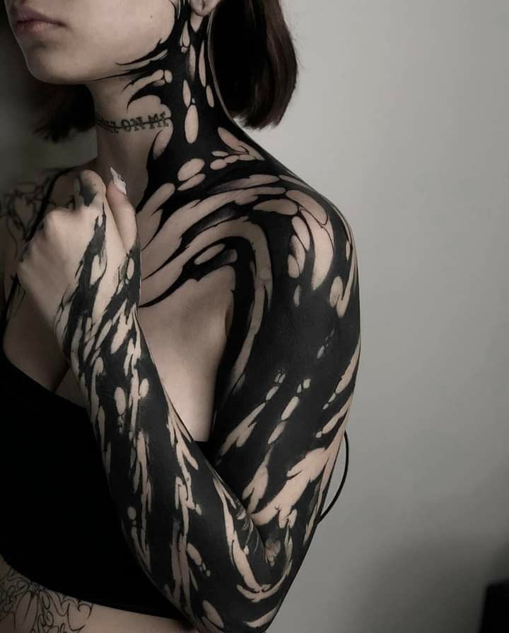 Discover Bold Blackout Tattoo Ideas : Full Sleeve, Geometric, Abstract, with White Ink