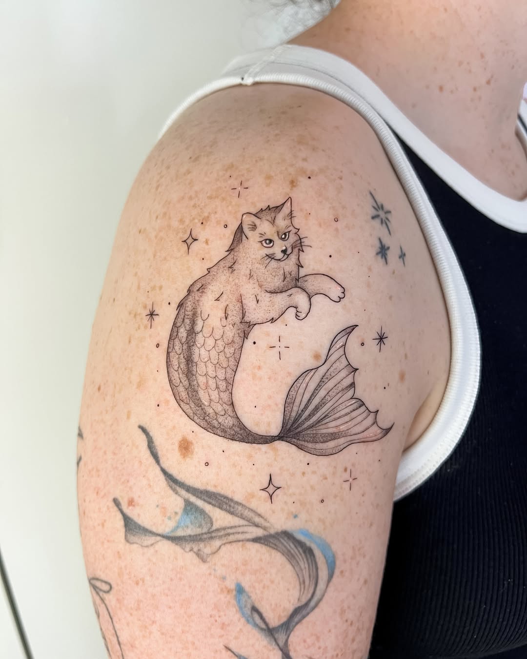 27 Mermaid Tattoo Ideas With Minimalist, Traditional, Afro, Siren, and Barbie-Inspired Designs