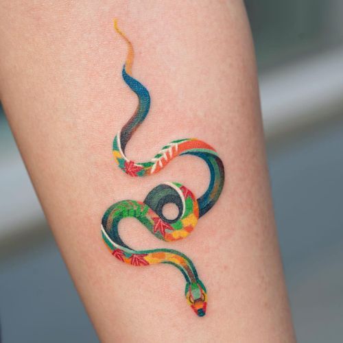 18 Snake Tattoo Hand Ideas for a Touch of Mystery