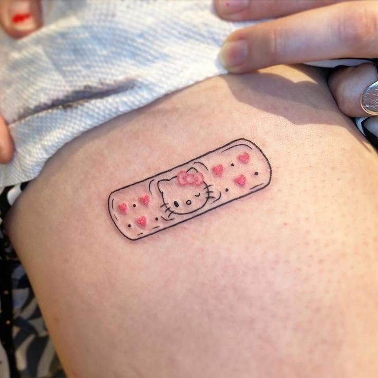 Hello Kitty Tattoo 29 Ideas for Women, Men & Couples Sleeve, Fine Line, Y2K, Cien Pies & More