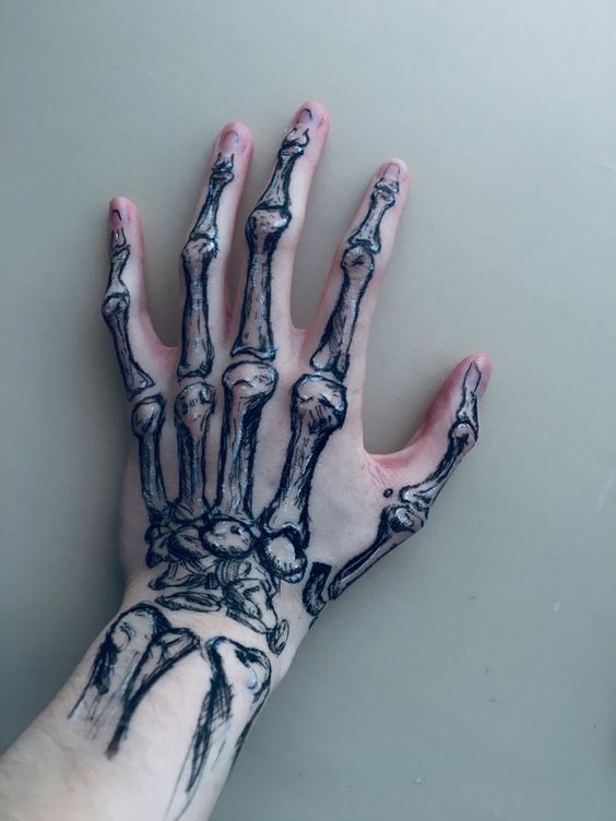 28 Skeleton Hand Tattoo Ideas Designs for Guy and Girl, Floral, Butterfly, Red ink and Full Body