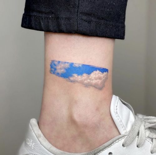 The Art of Cloud Tattoos: 22 Heavenly Designs for