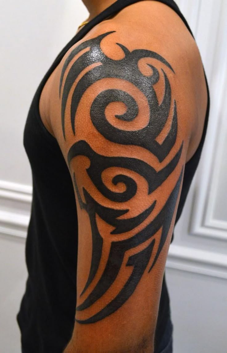 25 Ideas Tribal Tattoo Designs: Bold, Geometric, and Abstract Ink Styles
