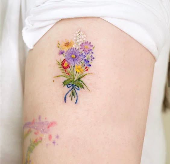 Discover 24 Stunning Flower Bouquet Tattoo Ideas: Delicate, Colorful, and Minimalist Designs