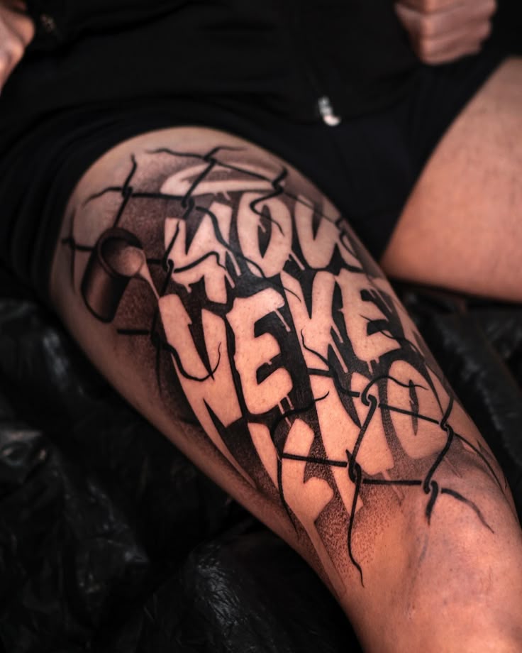 26 Lettering Tattoo Ideas for Men: Bold Fonts, Chicano, Japanese, Vertical, Fine Line & More