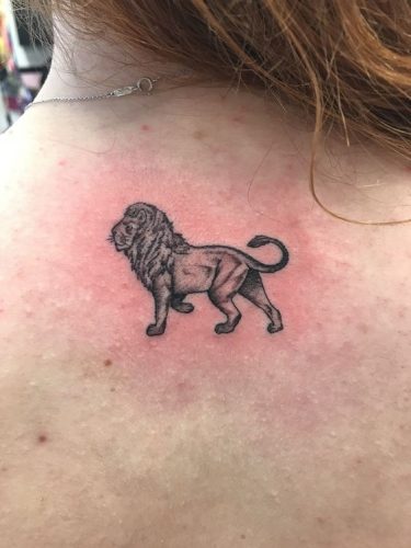 27 Minimalist Lion Tattoo: Subtle Elegance and Symbolism