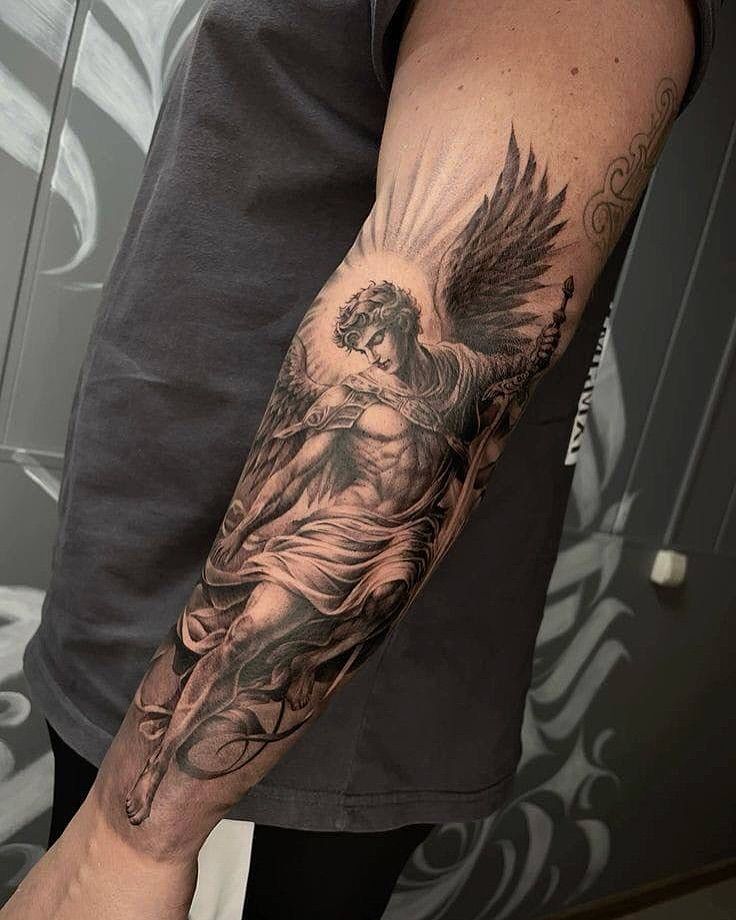 28 Archangel Michael Tattoo Designs for Men and Women   Realism, Sleeve, and Geometric Ideas