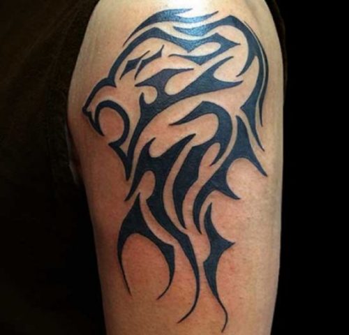 Leg Lion Tattoo: 22 Dynamic Designs for a Daring Look