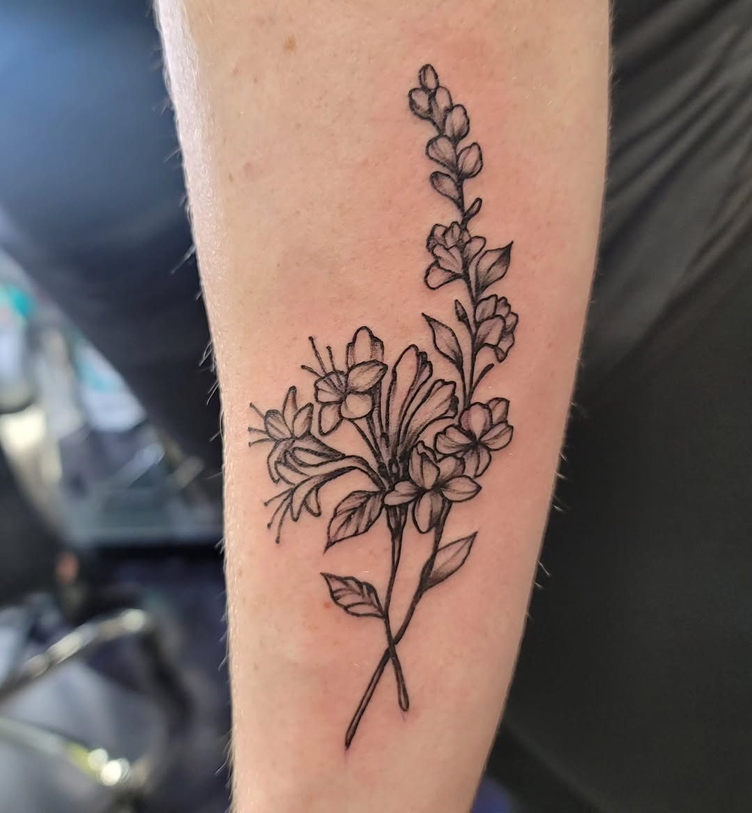 28 Larkspur Tattoo Ideas: Delicate July Blooms with Big Meaning