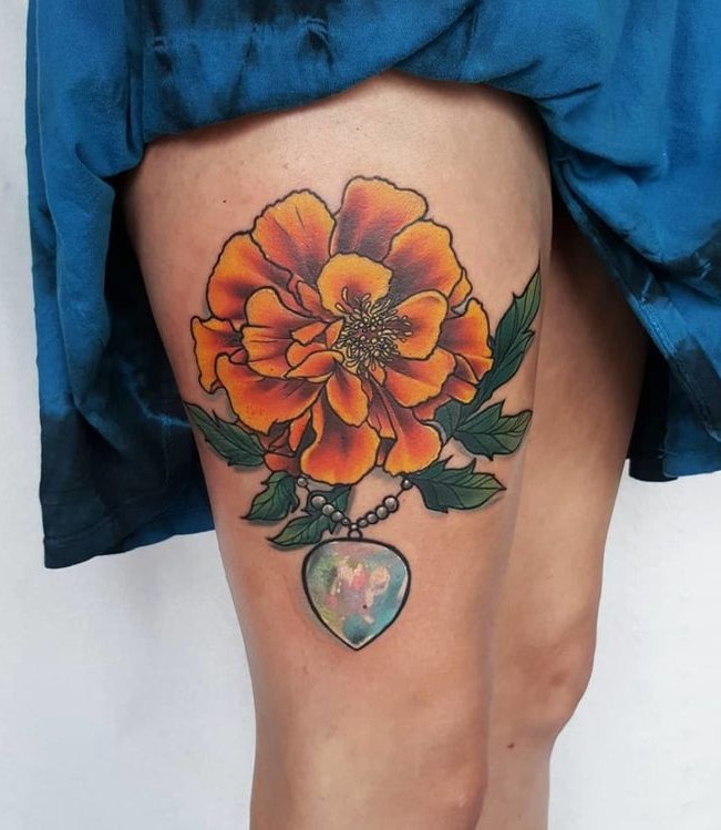 26 Marigold Tattoo Ideas for Every Style Fineline, Realistic, Black and White, Traditional, and Color Designs