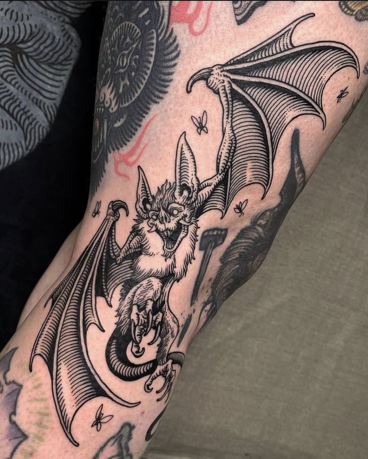 Bat Tattoo 25 Ideas in A Collection of Stencil, Gothic, Old School, and Simple Arm and Chest Tattoos