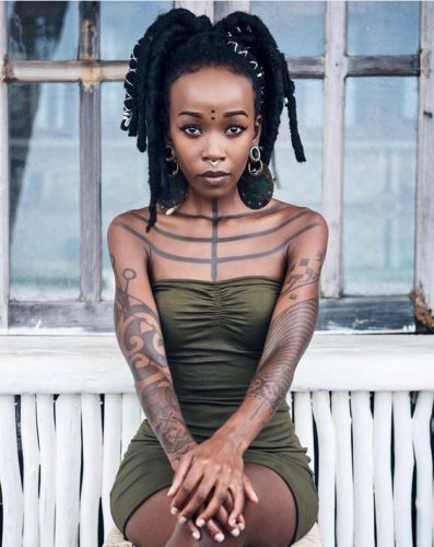 25 Colorful Tattoo Ideas for Dark Skin Tones