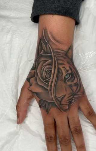 25 Tiger Tattoo on Hand Ideas