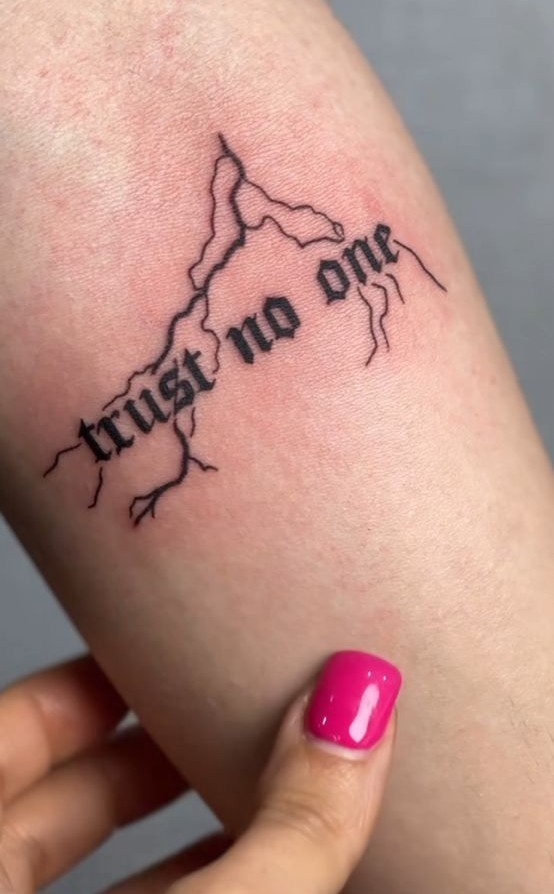 25 Trust No One Tattoo Designs with Lettering, Fonts, Ideas for Men and Women