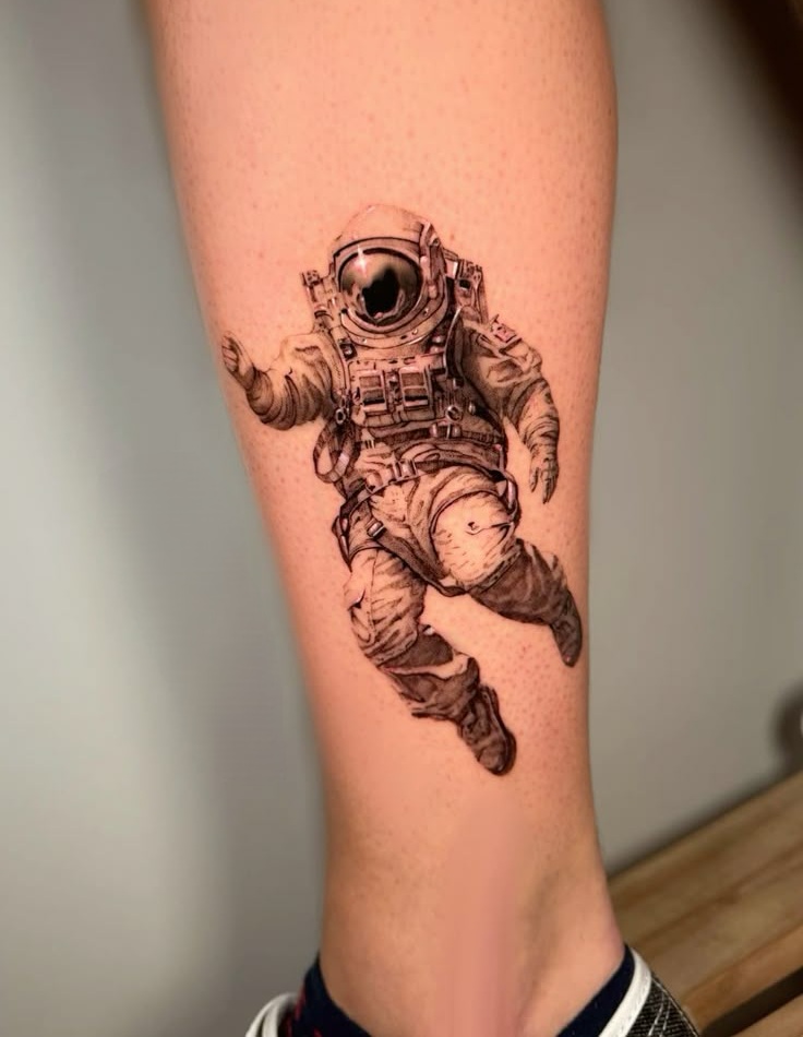 Astronaut Tattoo Ideas for Men and Women Minimalist, Stencil Outline, and Cosmic Designs