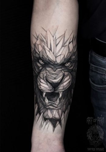27 Geometric Lion Tattoo: Striking Designs with Angular Elements