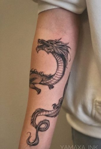 Unveil the Top 19 Masculine Arm Tattoos for Men: Trendsetting Ink Designs for