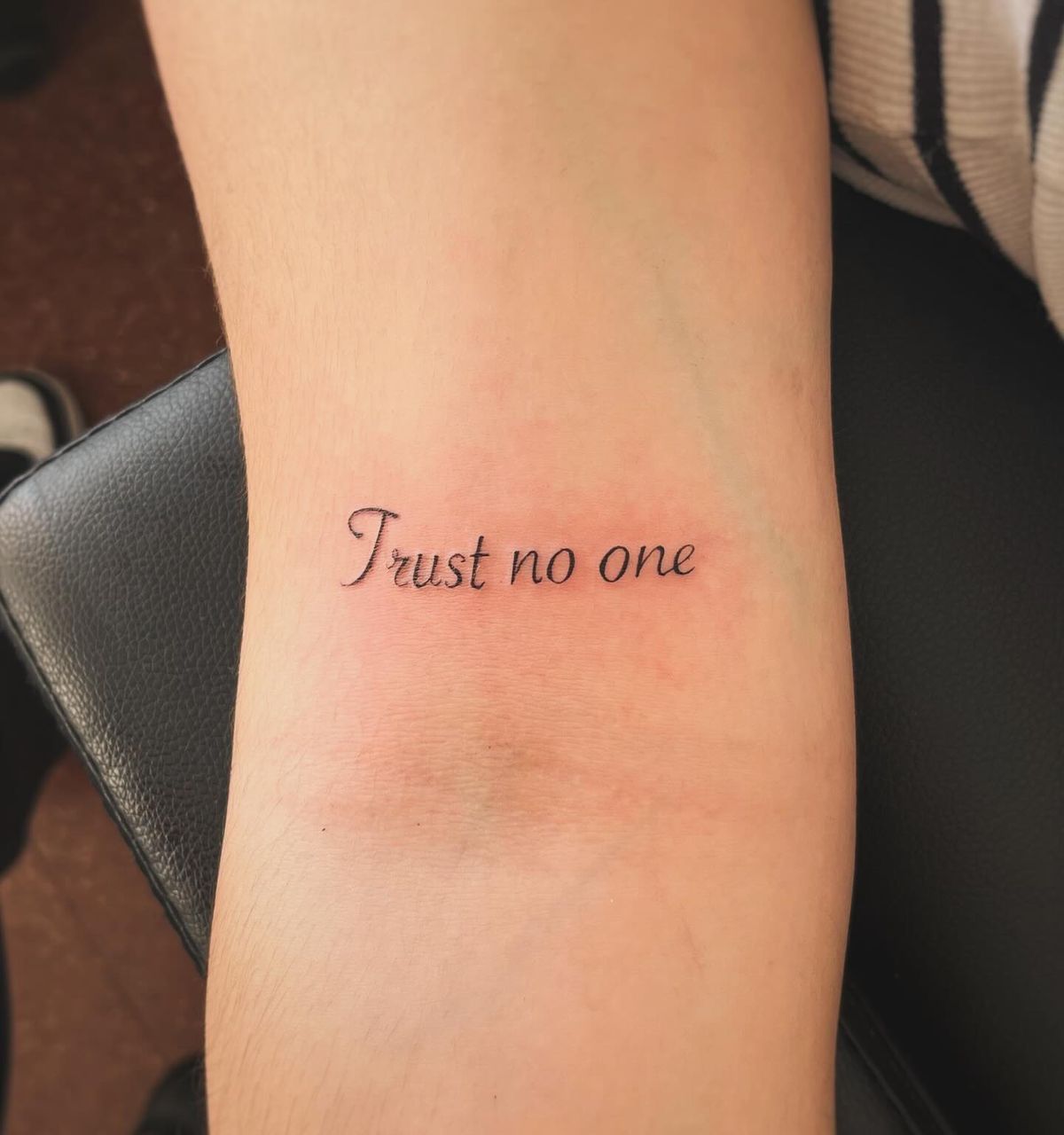25 Trust No One Tattoo Designs with Lettering, Fonts, Ideas for Men and Women