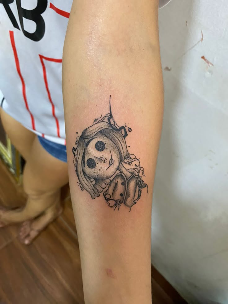 30 Coraline Tattoo Ideas: From Button-Eyed Whimsy to Dark Fairytale Ink