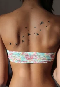 27 Delicate Spine Tattoo Ideas for Women