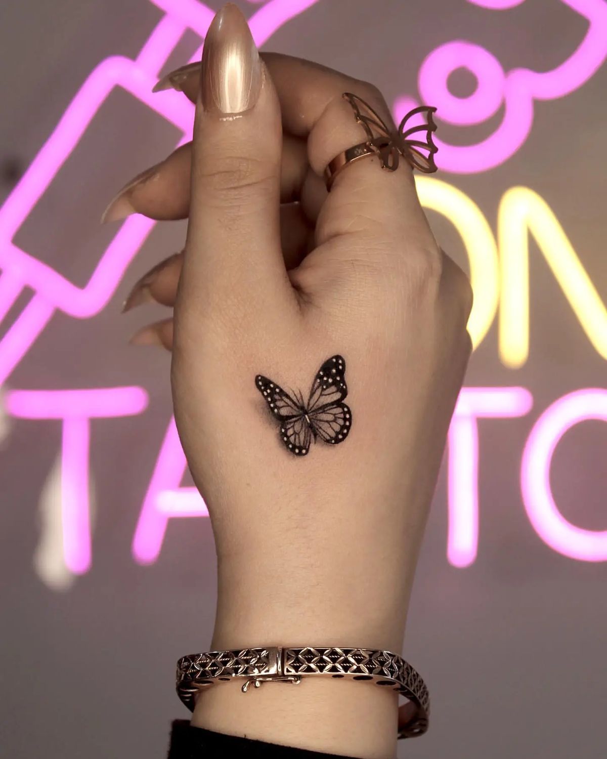 29 Butterfly Hand Tattoo Ideas Full of Meaning and Style