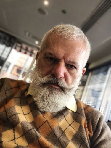 Explore Sophisticated Silver Fox Beards: 17 Top Styles for the Modern Man Over 50 in 