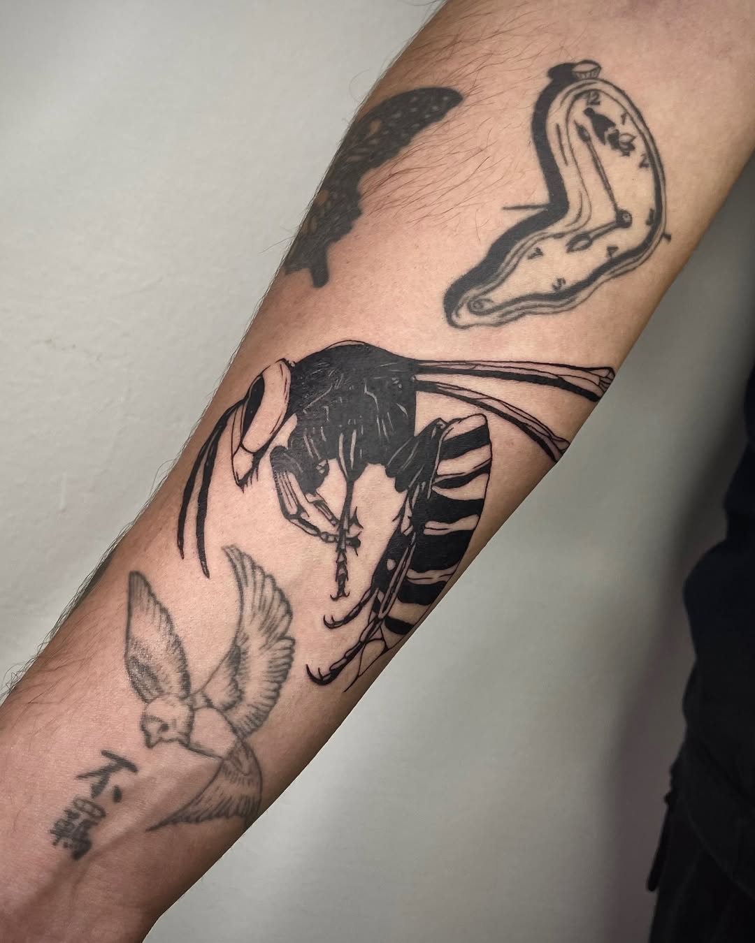 29 Filler Tattoo Ideas: Smart Ways to Close Gaps in Your Sleeve with Flowers, Snakes and Symbols