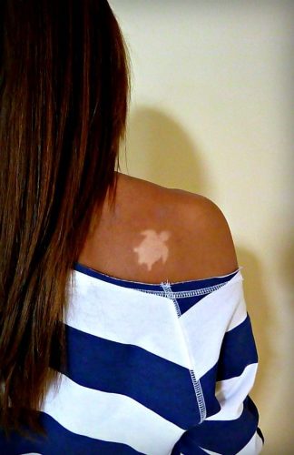 15 Creative Tan Tattoo Ideas for : Embrace the Sun with Stylish Skin Art