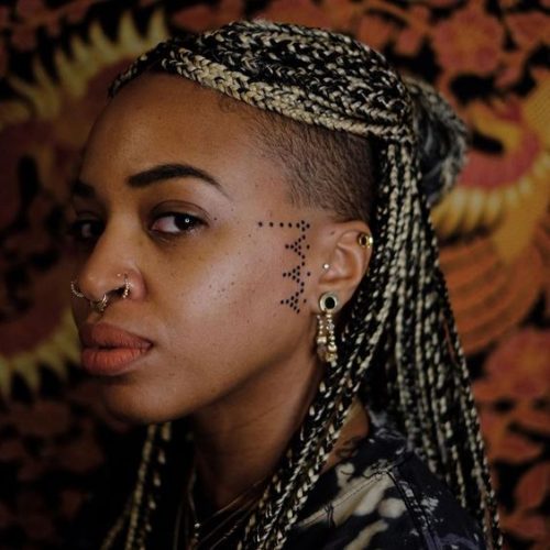 29 Colored Tattoo Ideas for Brown Skin Tones