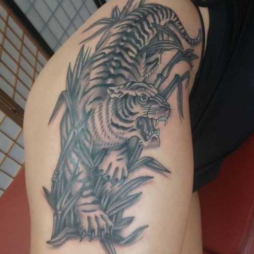 25 Tiger Tattoo on Thigh Ideas