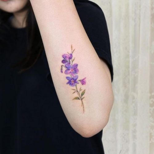 Discover the Charm of February Birth Flower Tattoos: Violets & Primroses Ink Ideas