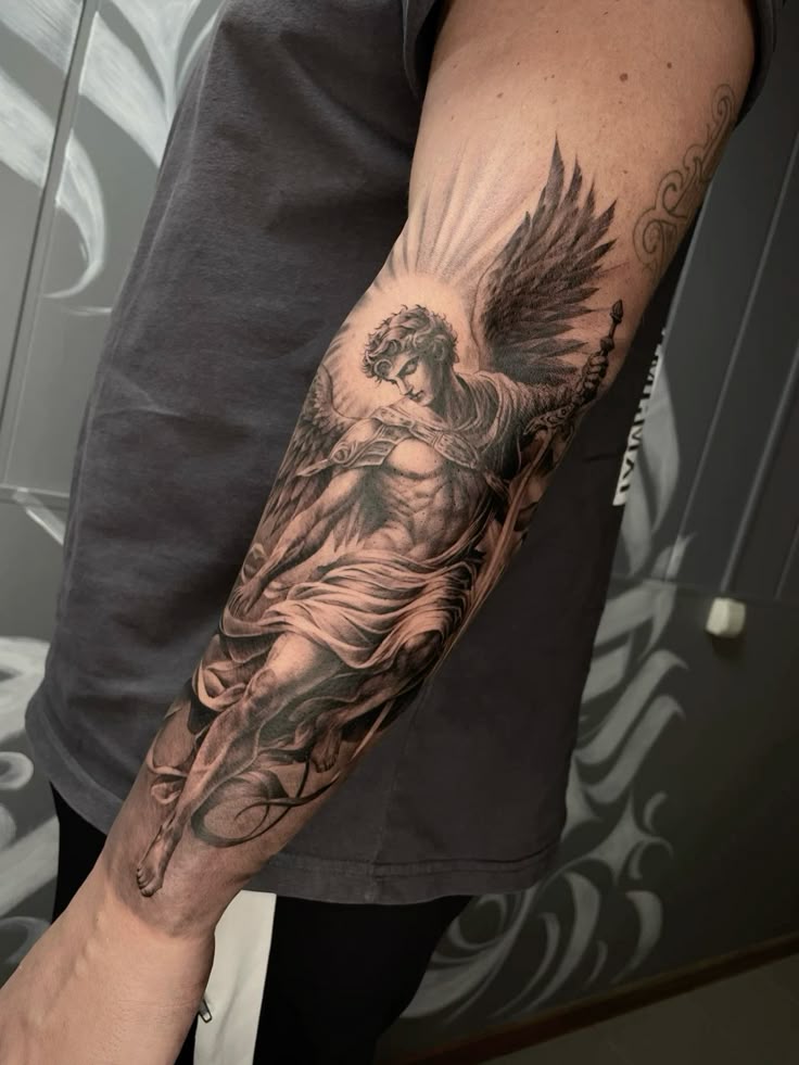 28 Archangel Michael Tattoo Designs for Men and Women   Realism, Sleeve, and Geometric Ideas