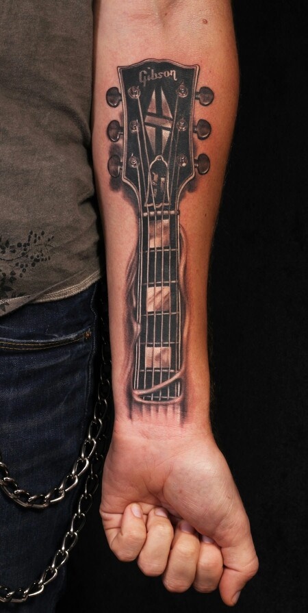 31 Guitar Tattoo Ideas for Music Lovers: From Minimalist Designs to Bold Sleeve Art