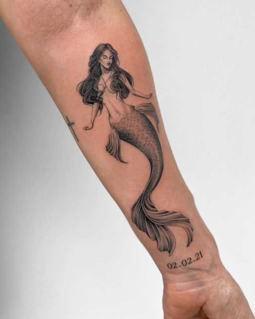 27 Mermaid Tattoo Ideas With Minimalist, Traditional, Afro, Siren, and Barbie-Inspired Designs