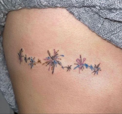 20 Captivating Firework Tattoo Designs for : Ignite Your Skin with Artistic Brilliance