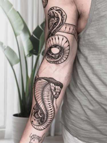 16 Snake Tattoos Wrapped Around Arm Inspiration