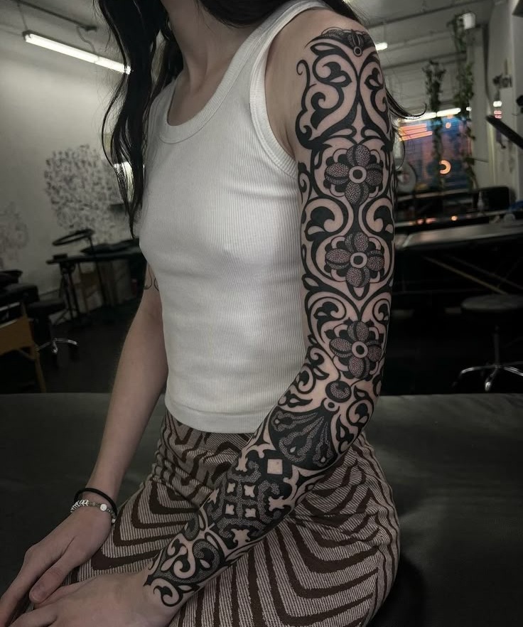 Discover Bold Blackout Tattoo Ideas : Full Sleeve, Geometric, Abstract, with White Ink