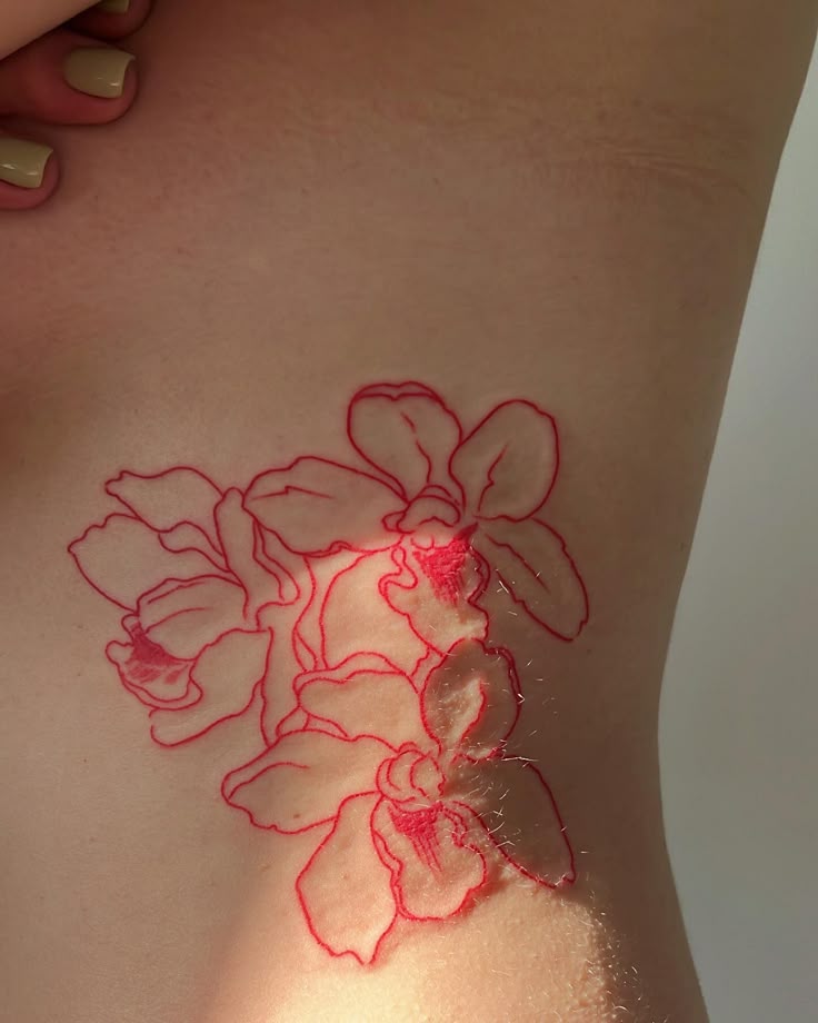 26 Orchid Tattoo Ideas for Minimalist, Colour, and Fine Line Designs