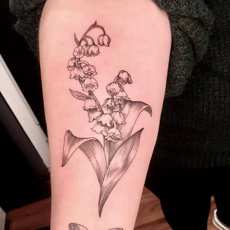 26 Stunning Lily of the Valley Tattoo Ideas