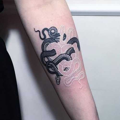 18 Snake Tattoo Hand Ideas for a Touch of Mystery