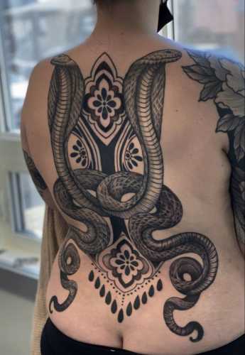 19 Snake Tattoos on Back Ideas for a Striking Look